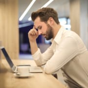man concentrating over laptop Cape Cod Uncontested Divorce and mediation