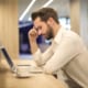 man concentrating over laptop Cape Cod Uncontested Divorce and mediation